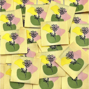 Étiquette tissée à coudre : Fleur au Trait